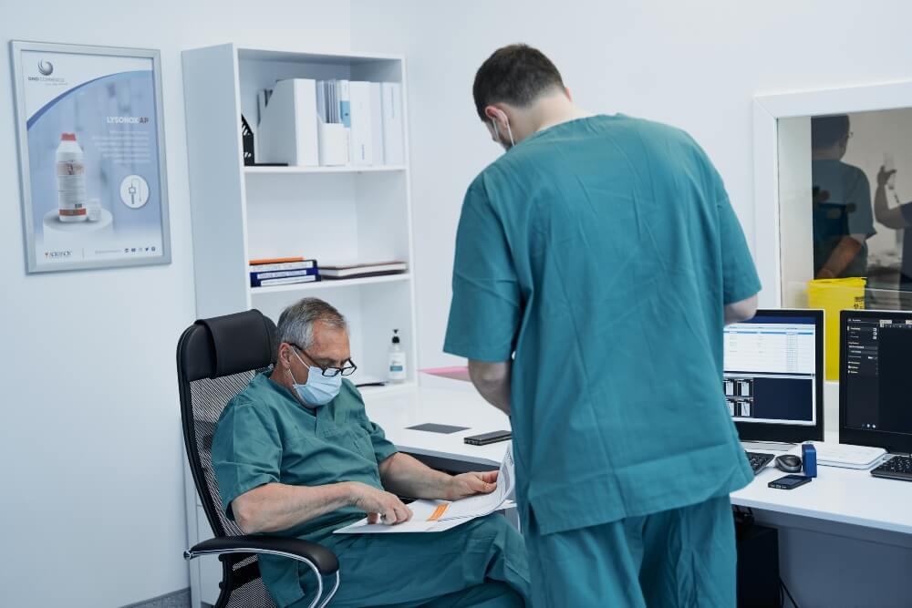 The doctor reviews the patient's results at Pulse Cardiology Center