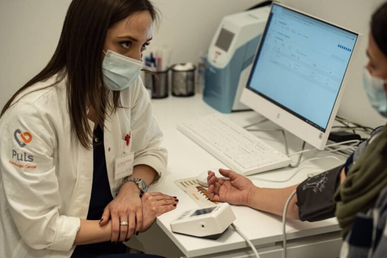 Doctor Is Measuring the Blood Pressure to the Patient