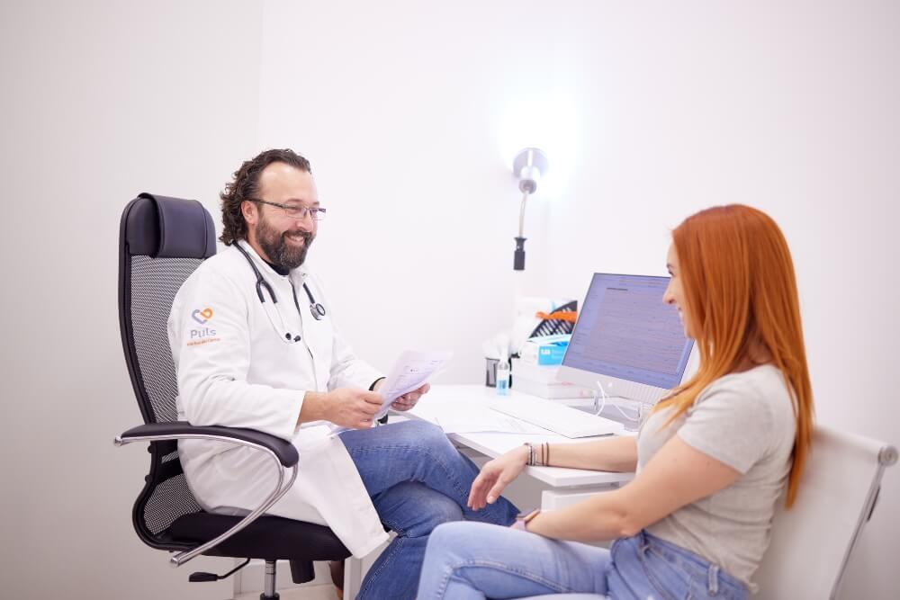 Female patient during a consultation with a cardiologist at Pulse Cardiology Center